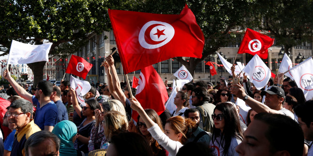 Tunisians demonstrate against a bill that would protect those accused of corruption from prosecution, on Habib Bourguiba Avenue in Tunis