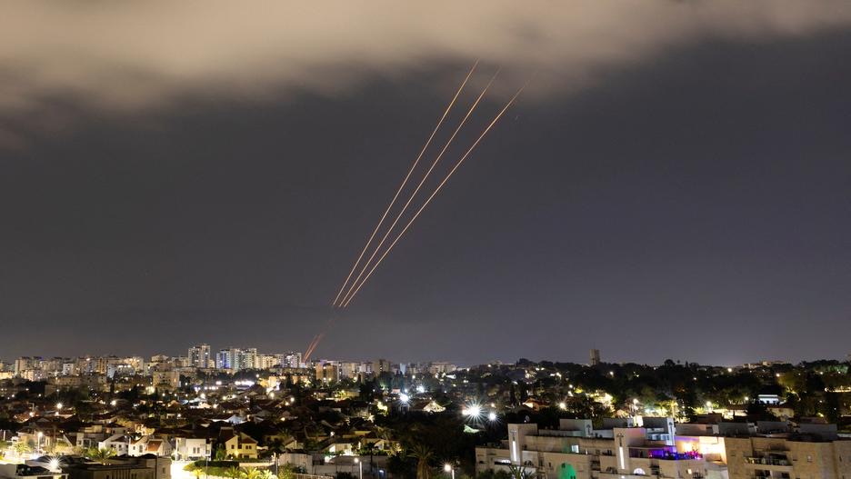 An anti-missile system operates after Iran launched drones and missiles towards Israel, as seen from Ashkelon